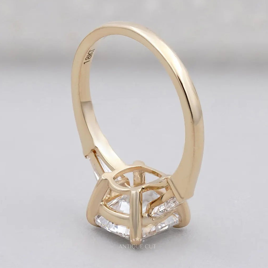 Yellow gold old mine cushion diamond ring with side stones