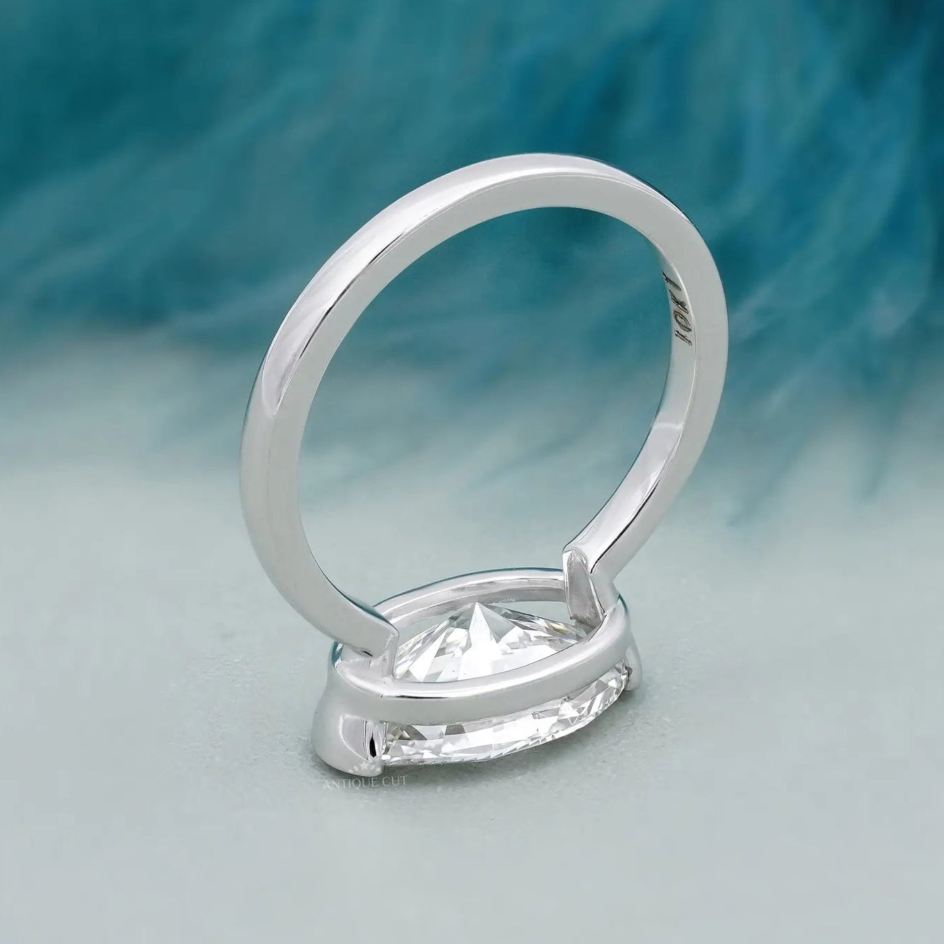 Oval lab grown diamond east west engagement ring