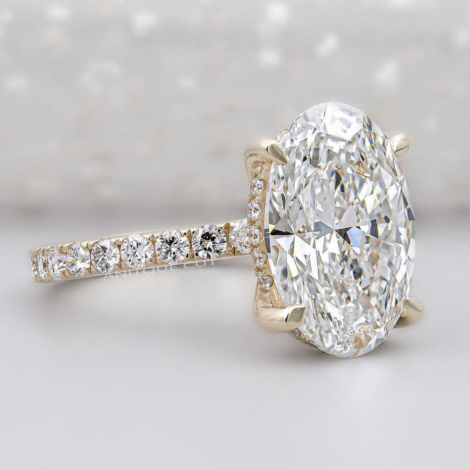 Yellow gold oval cut hidden halo diamond engagement ring