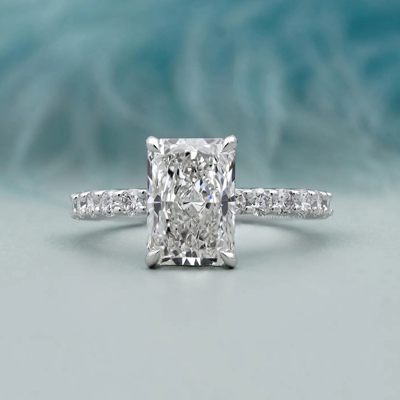 Radiant cut pave diamond engagement ring in white gold