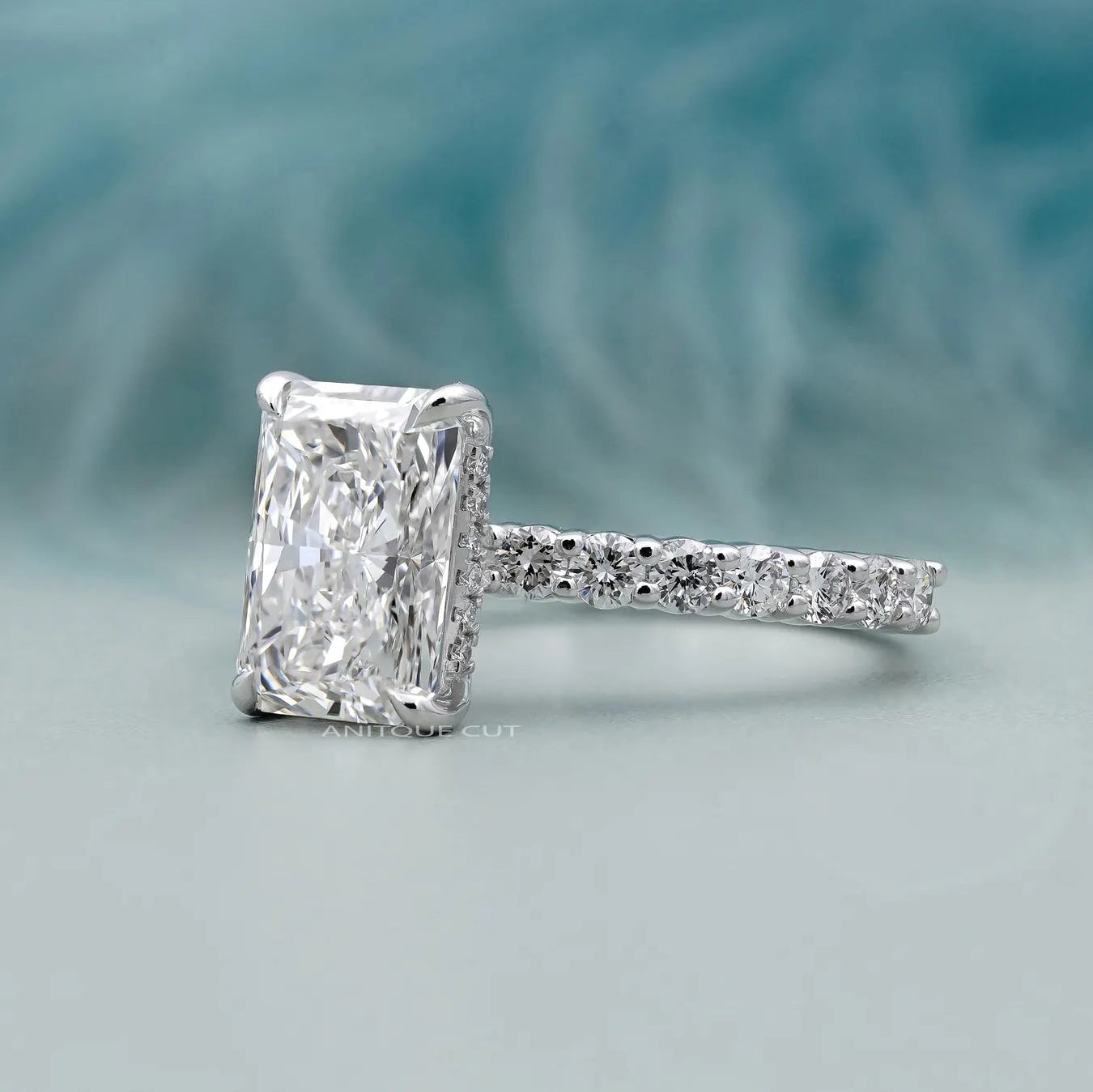 White gold radiant diamond ring with hidden halo setting