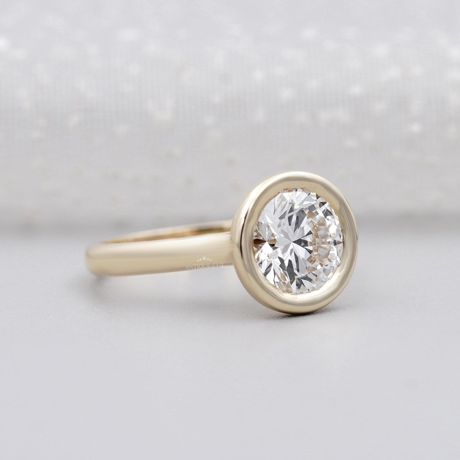 IGI certified round diamond bezel ring