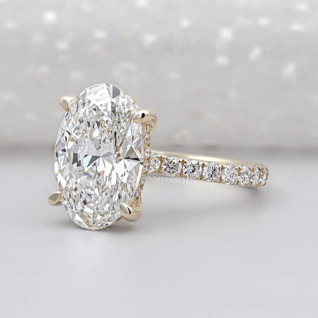 Lab Grown Hidden Halo Oval Engagement Ring With Round Diamond Pave Band