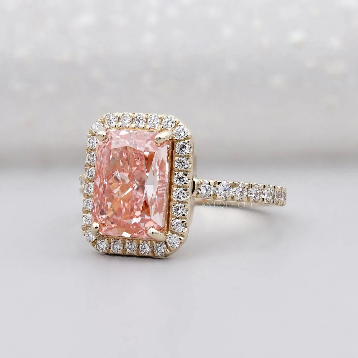 Fancy Pink Radiant Cut Diamond Ring With Halo Setting And Pave Band | IGI Certified