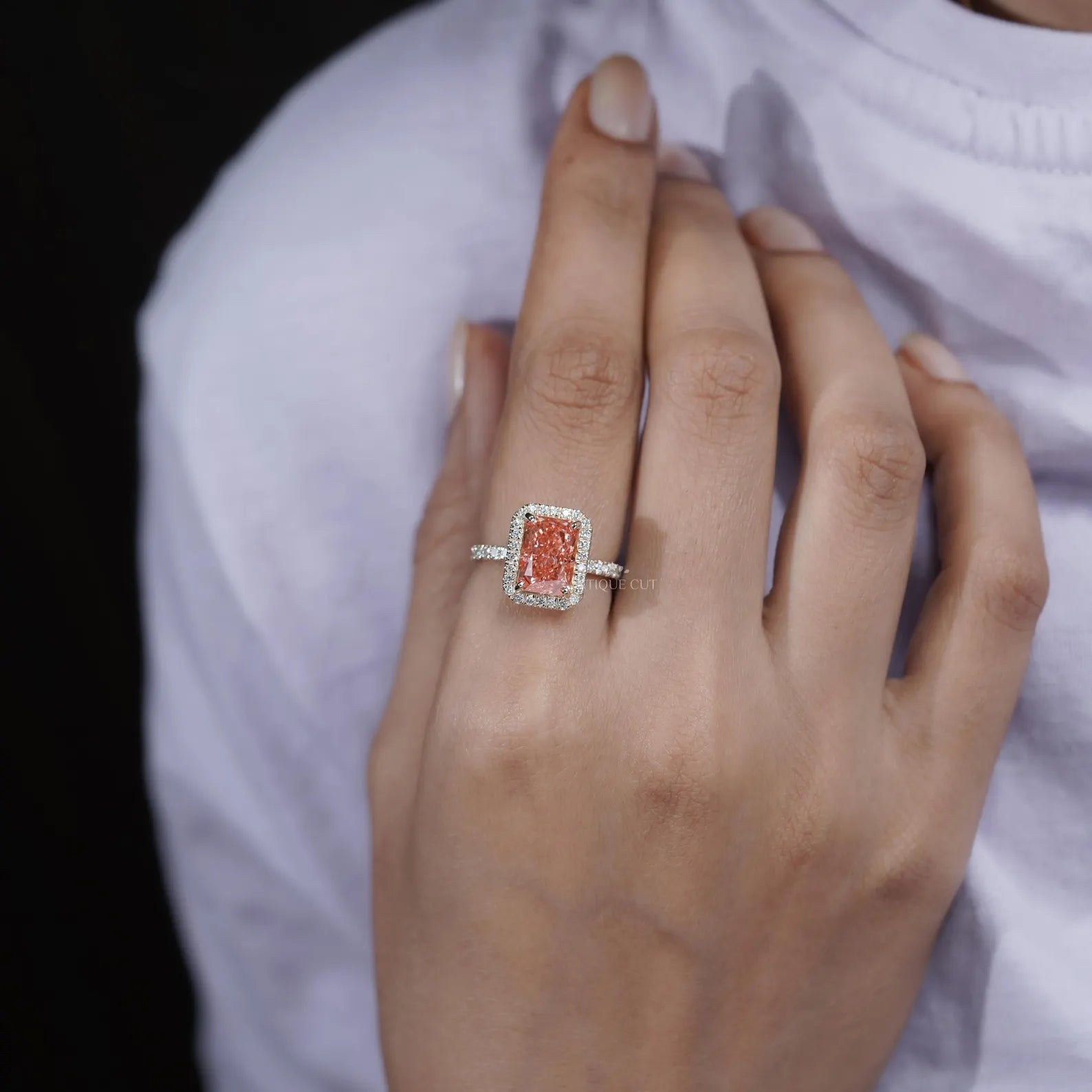 Fancy Pink Radiant Cut Diamond Ring With Halo Setting And Pave Band | IGI Certified