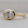 Lab grown oval diamond hidden halo engagement ring