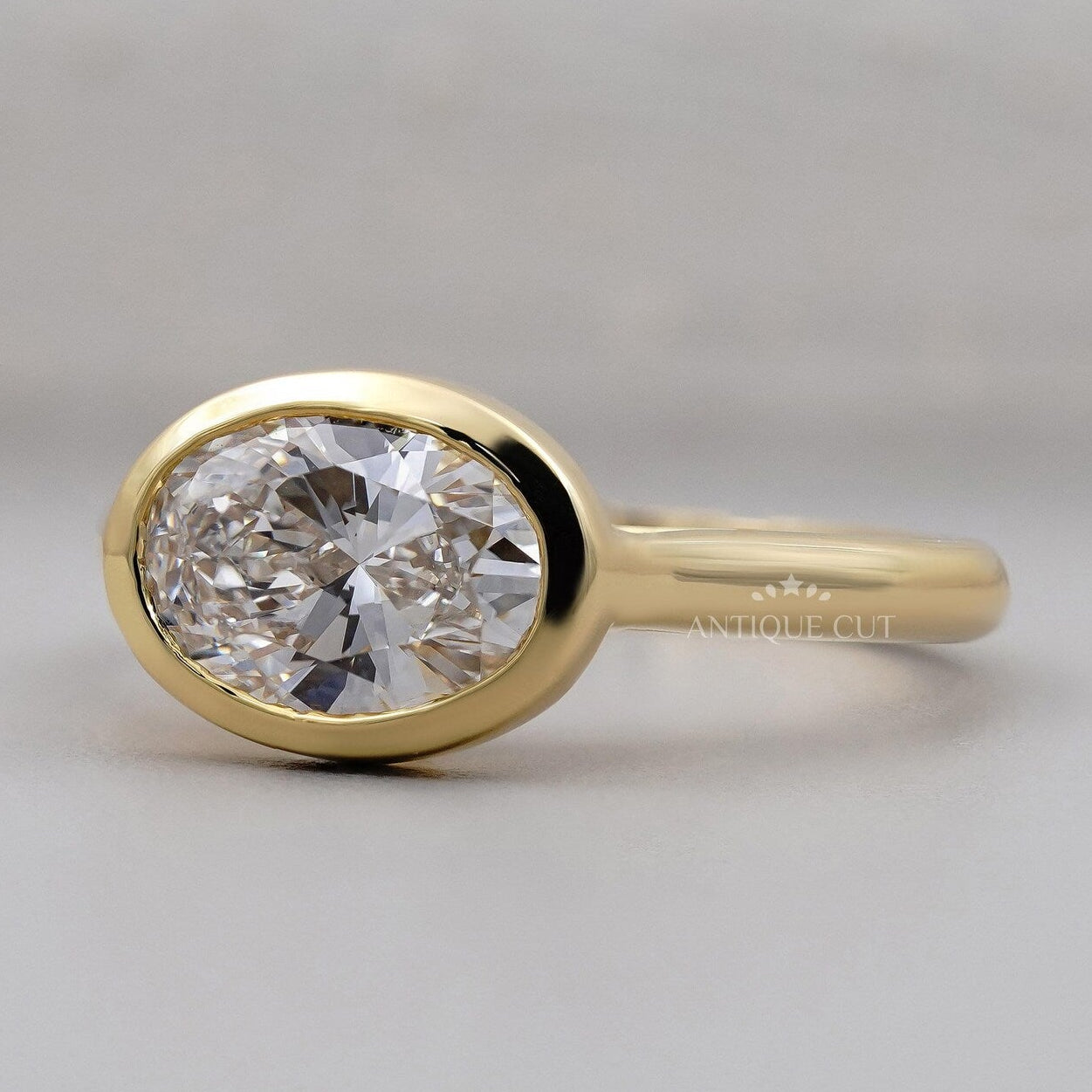 Lab grown oval diamond hidden halo engagement ring