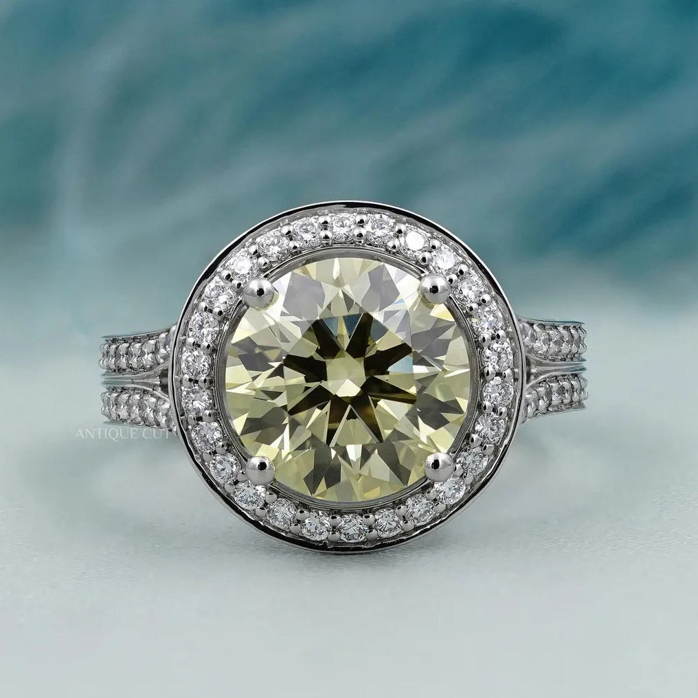 Yellow round diamond ring split shank halo white gold
