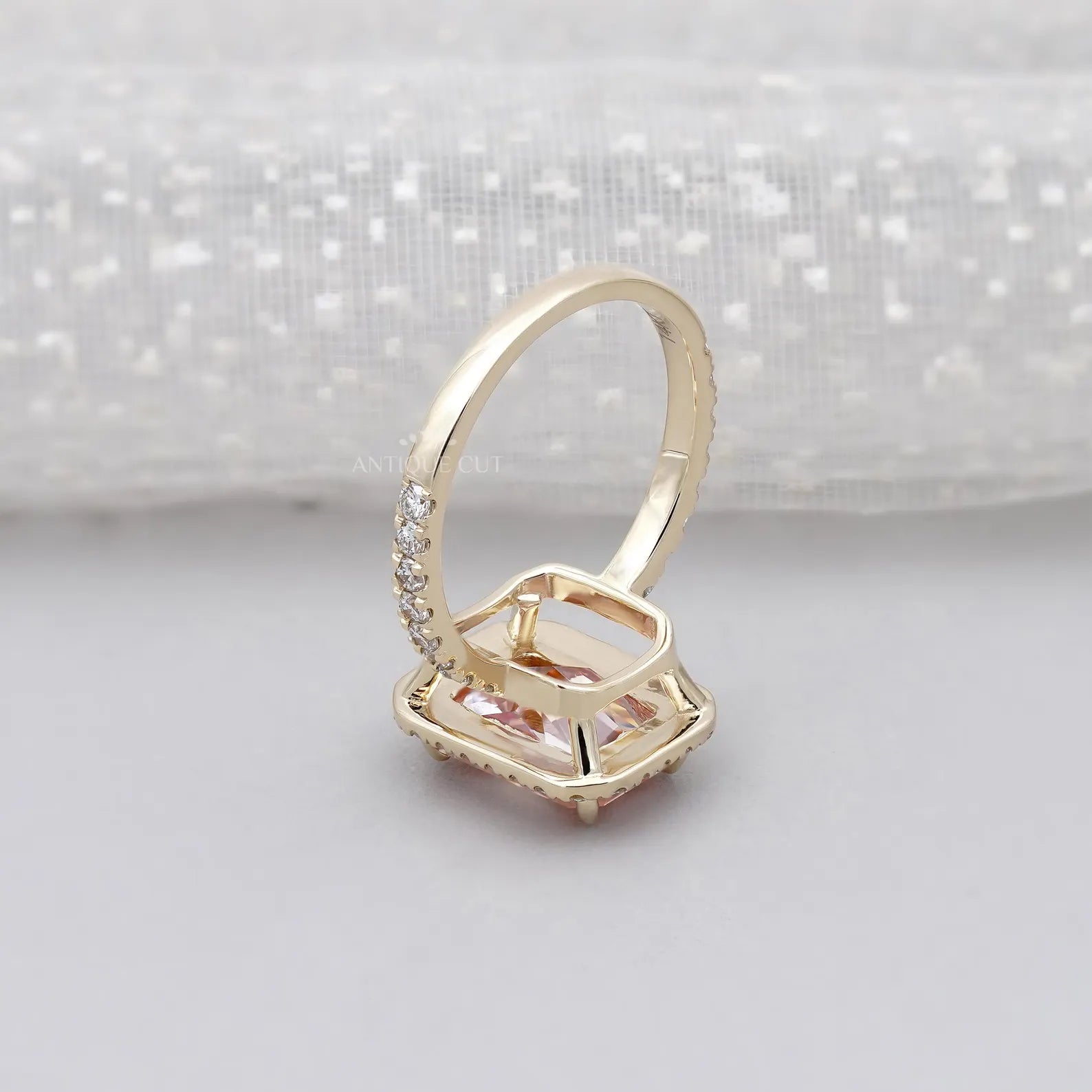 Fancy Pink Radiant Cut Diamond Ring With Halo Setting And Pave Band | IGI Certified