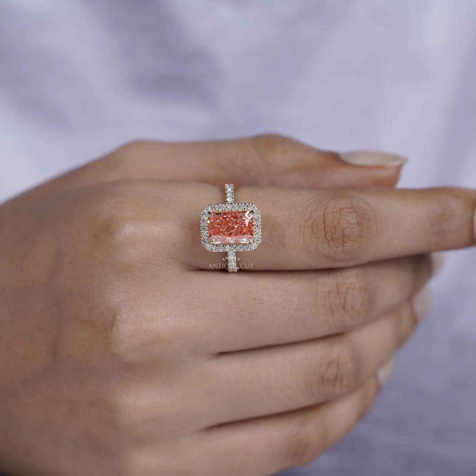 Fancy Pink Radiant Cut Diamond Ring With Halo Setting And Pave Band | IGI Certified