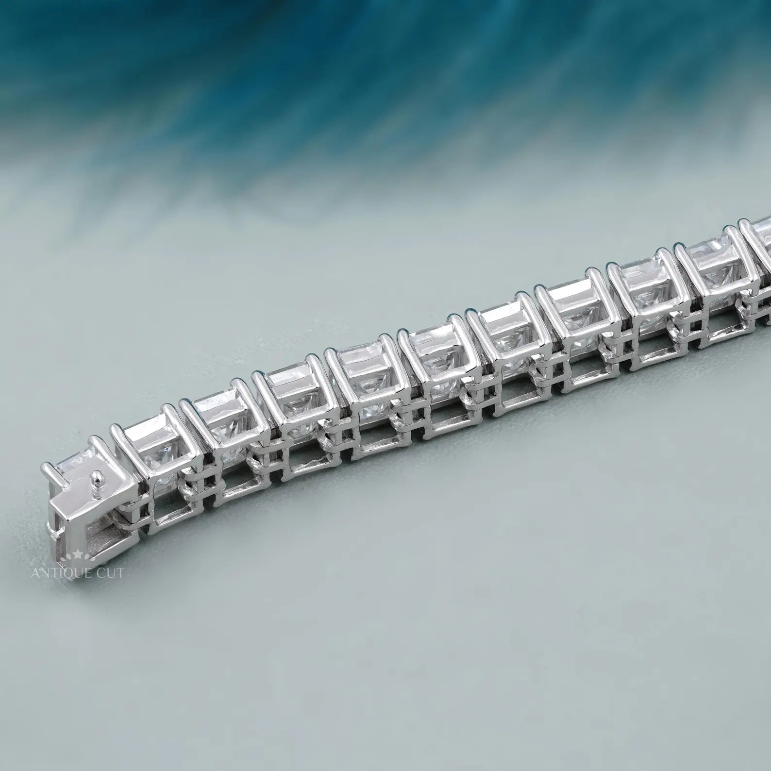 Diamond bracelet on a gradient blue and gray background
