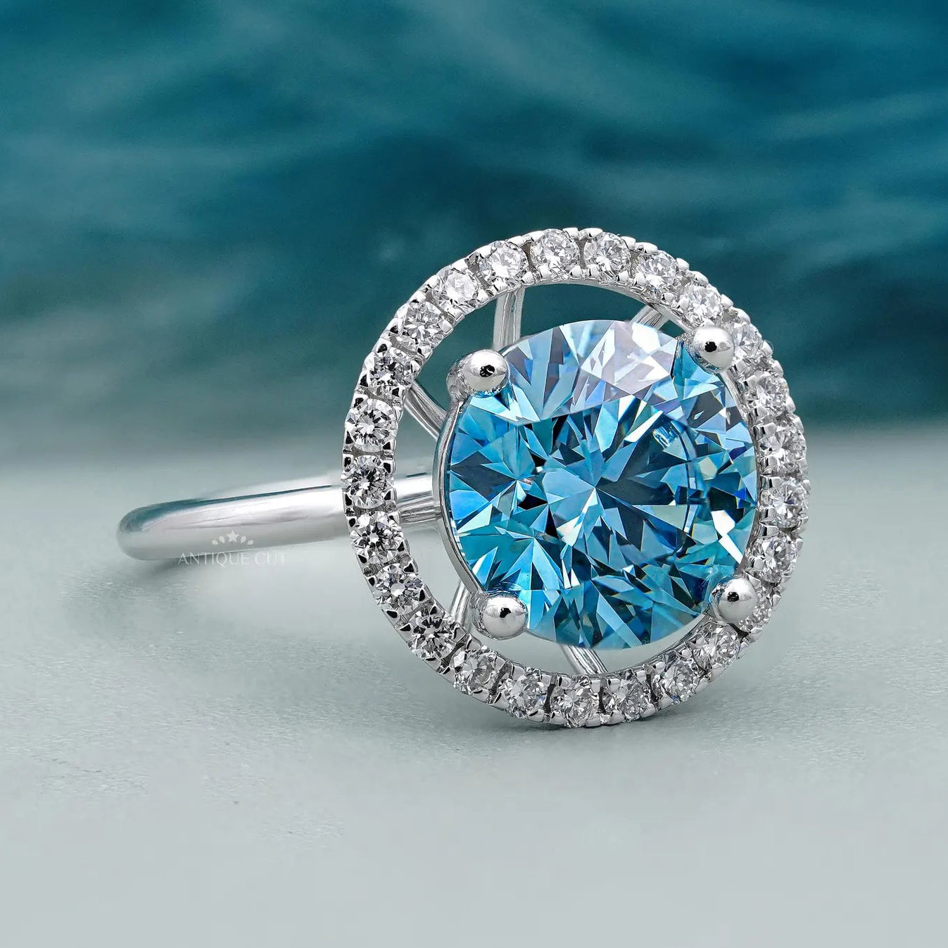 Fancy Blue Diamond Ring | Round Halo Engagement Ring With 4 Prong Setting | IGI Certified