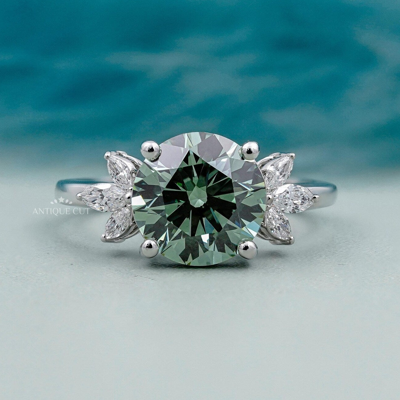 Round cut Antique Green Diamond Ring with Marquise Side Stone | IGI Certified
