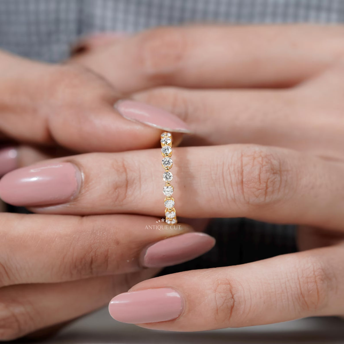 Yellow gold diamond wedding band with round cut stones