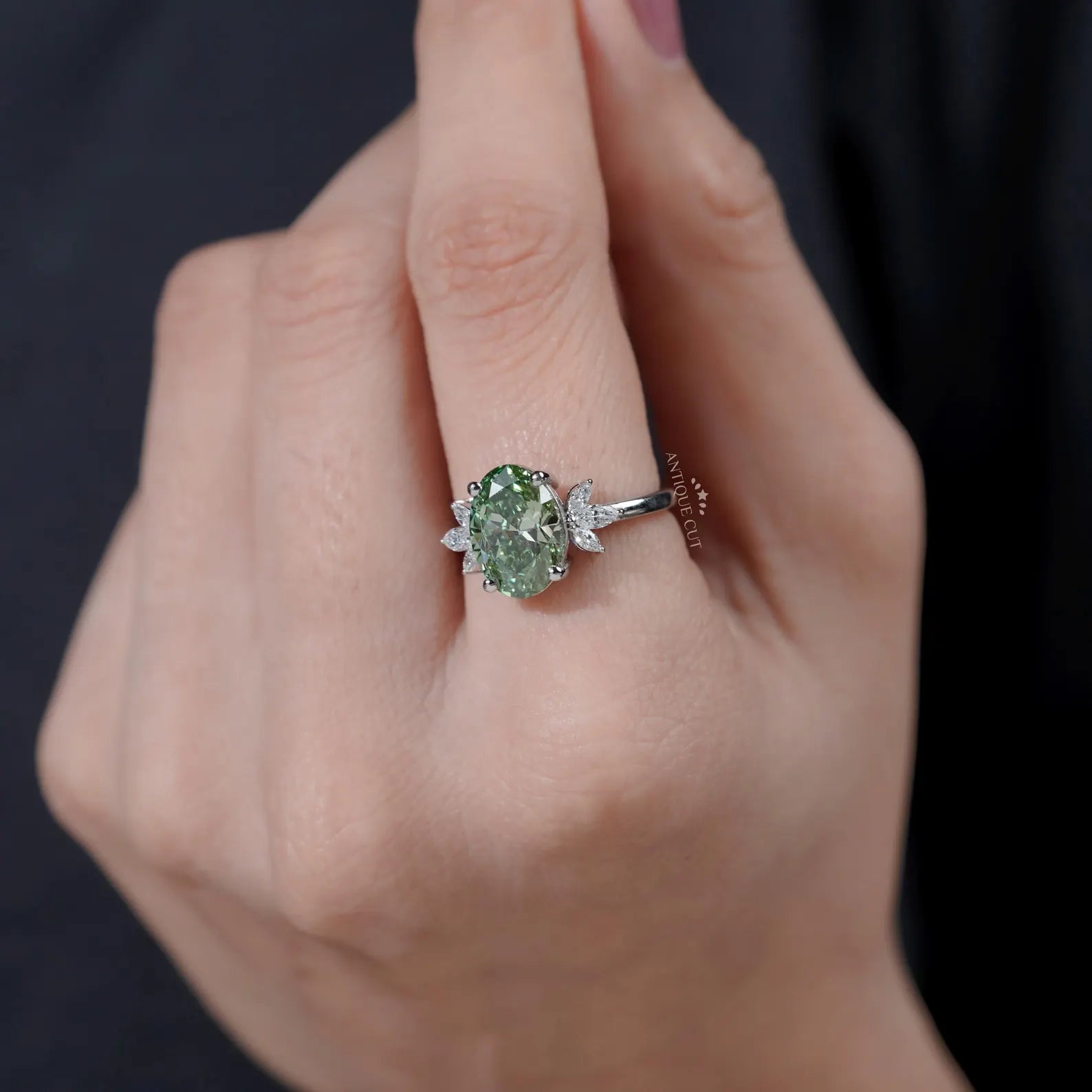 Oval Cut Antique Green Diamond Ring With Marquise Side Stones
