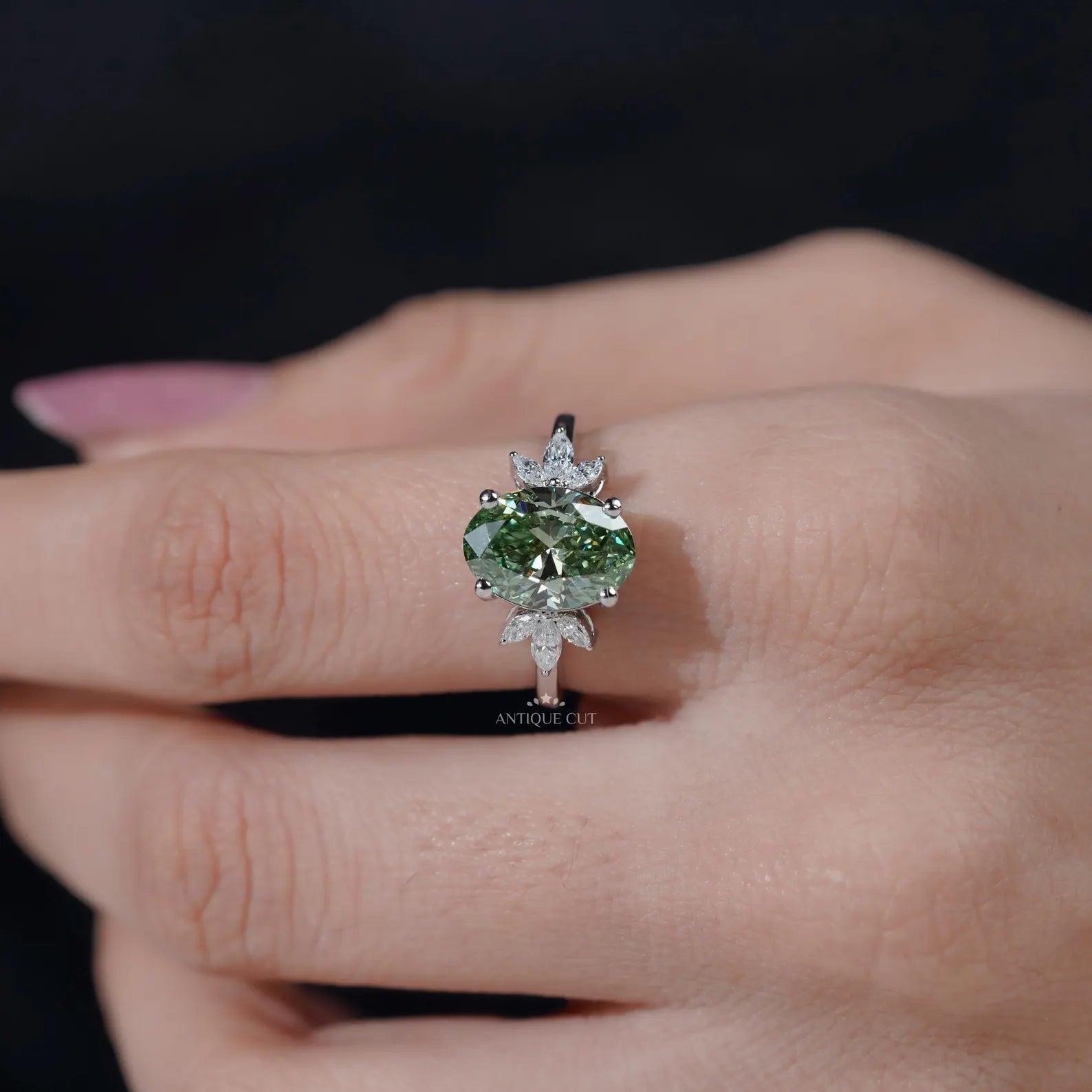 Oval Cut Antique Green Diamond Ring With Marquise Side Stones