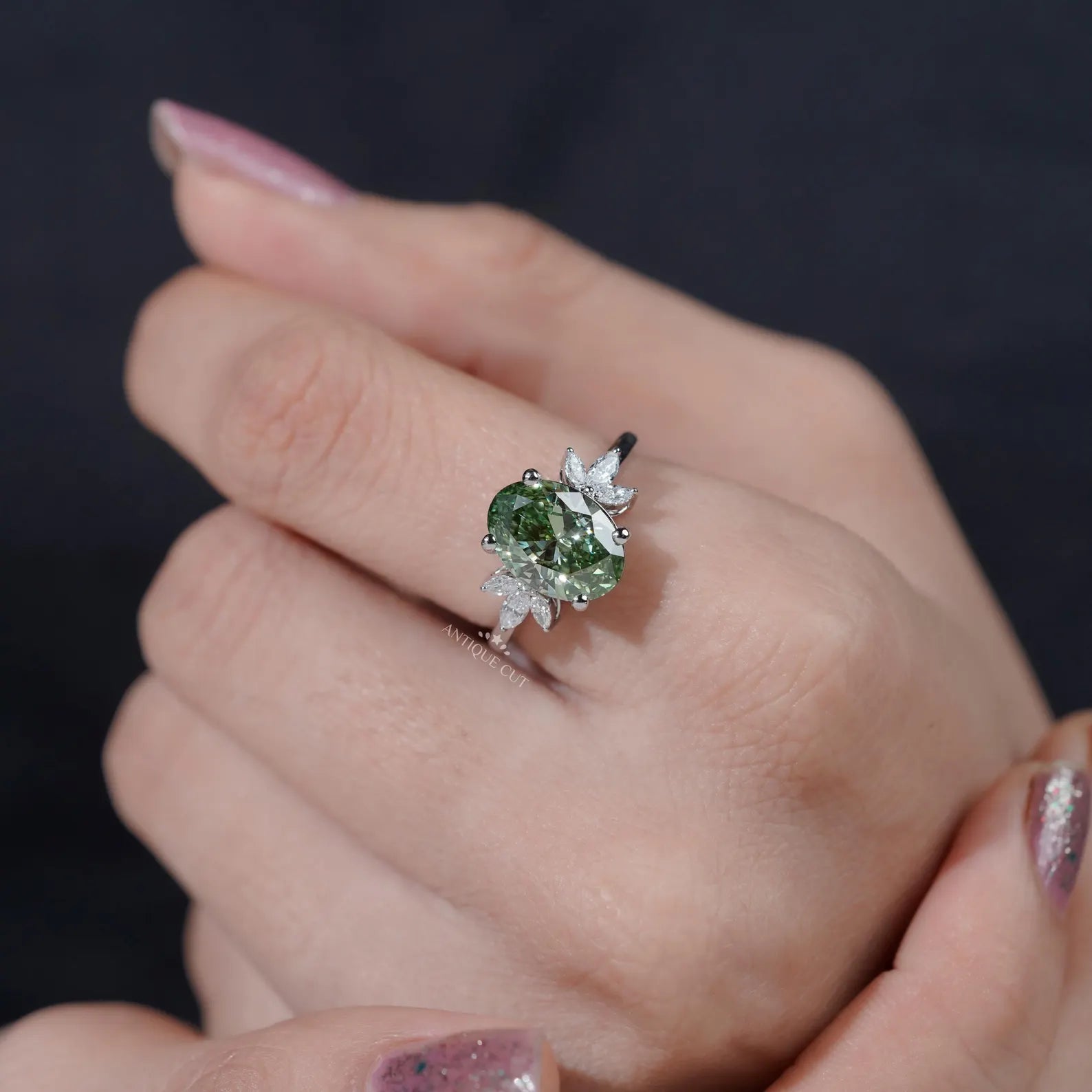 Oval Cut Antique Green Diamond Ring With Marquise Side Stones