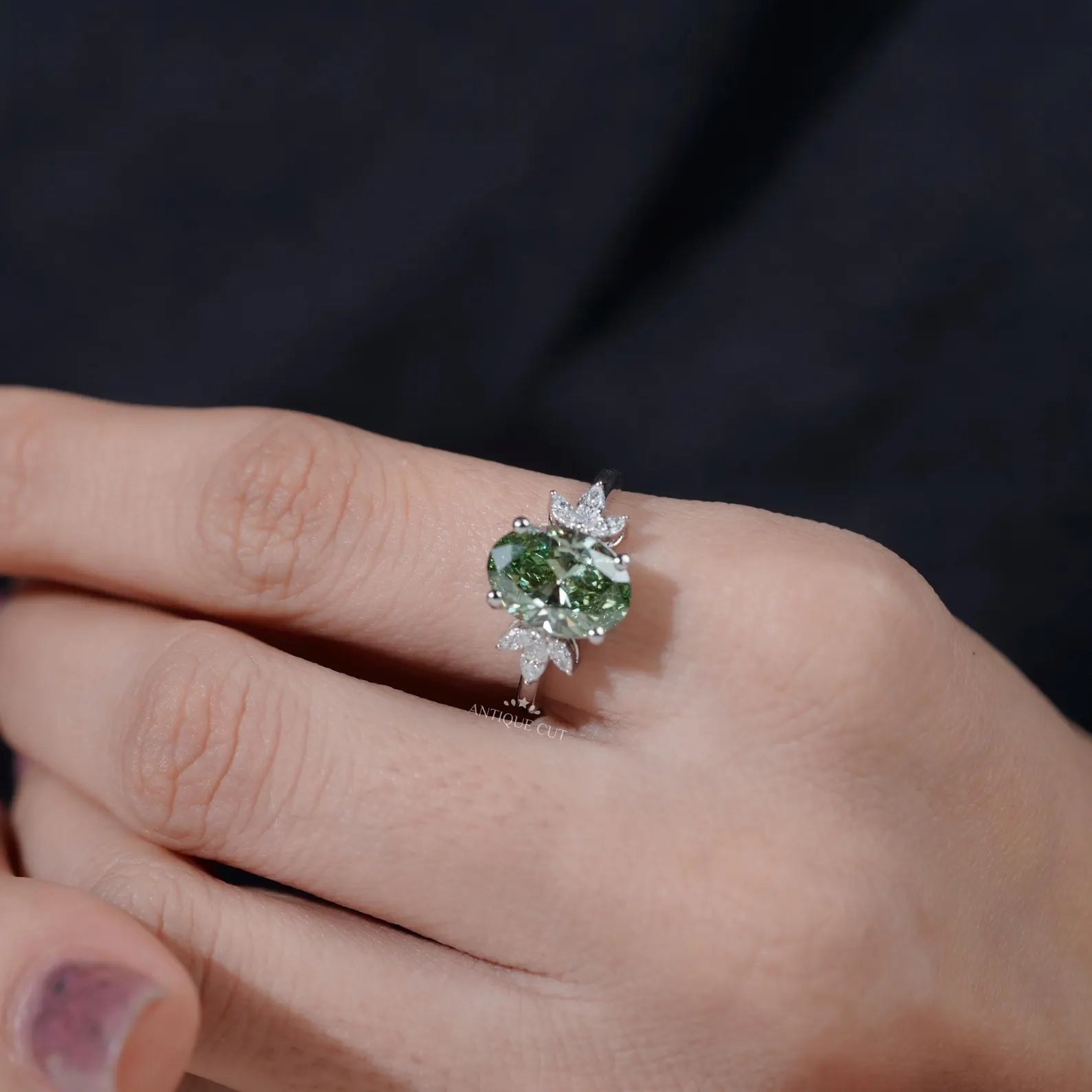 Oval Cut Antique Green Diamond Ring With Marquise Side Stones