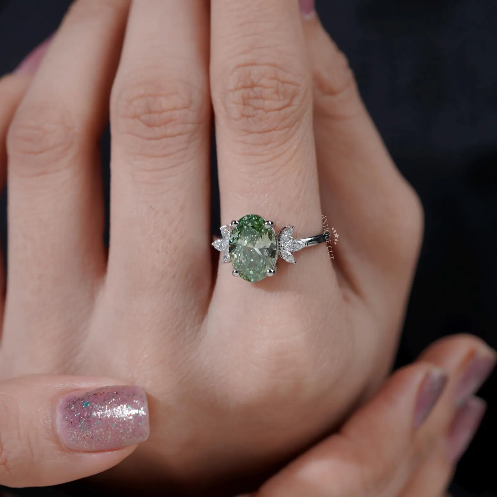 Oval Cut Antique Green Diamond Ring With Marquise Side Stones