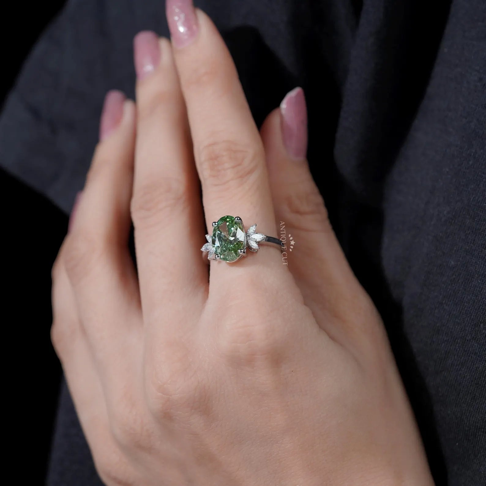 Oval Cut Antique Green Diamond Ring With Marquise Side Stones