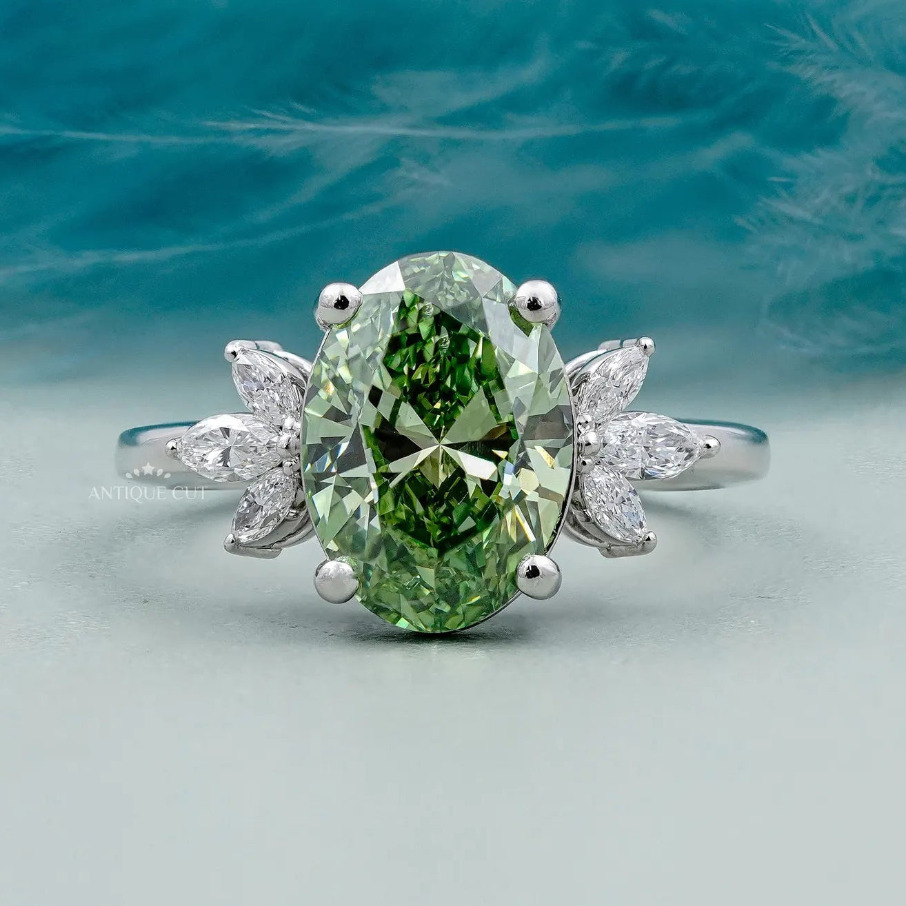 Oval Cut Antique Green Diamond Ring With Marquise Side Stones