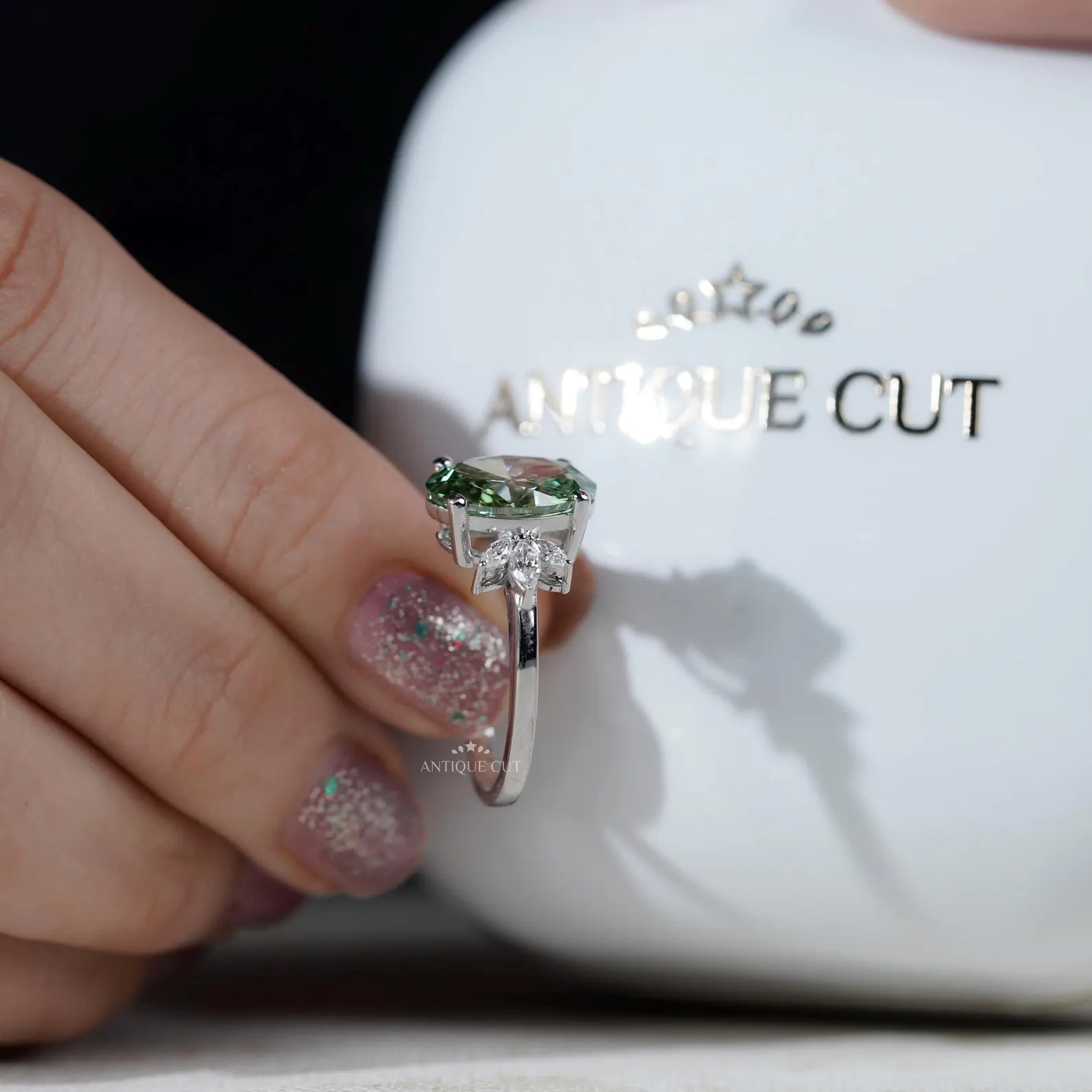 Oval Cut Antique Green Diamond Ring With Marquise Side Stones