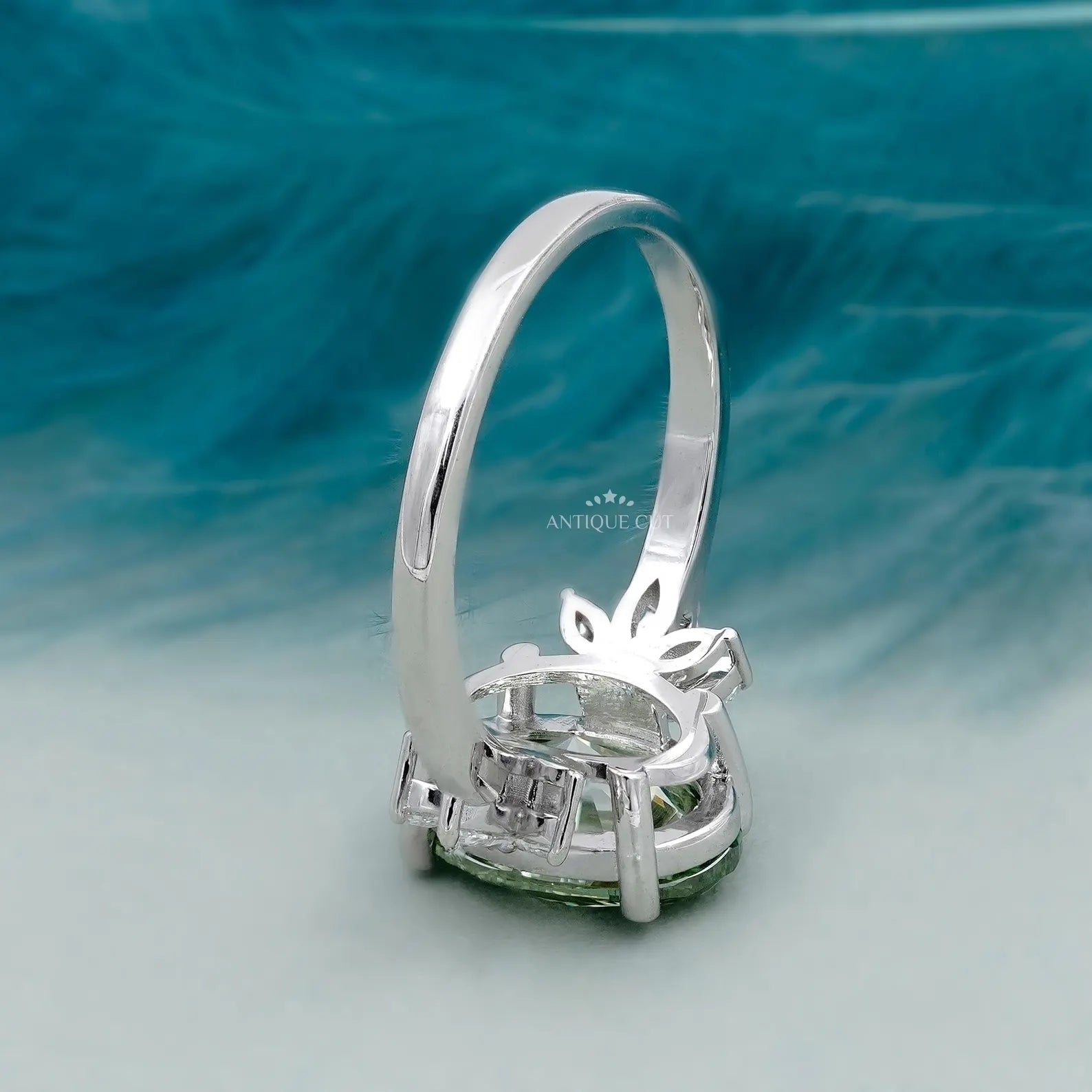 Oval Cut Antique Green Diamond Ring With Marquise Side Stones