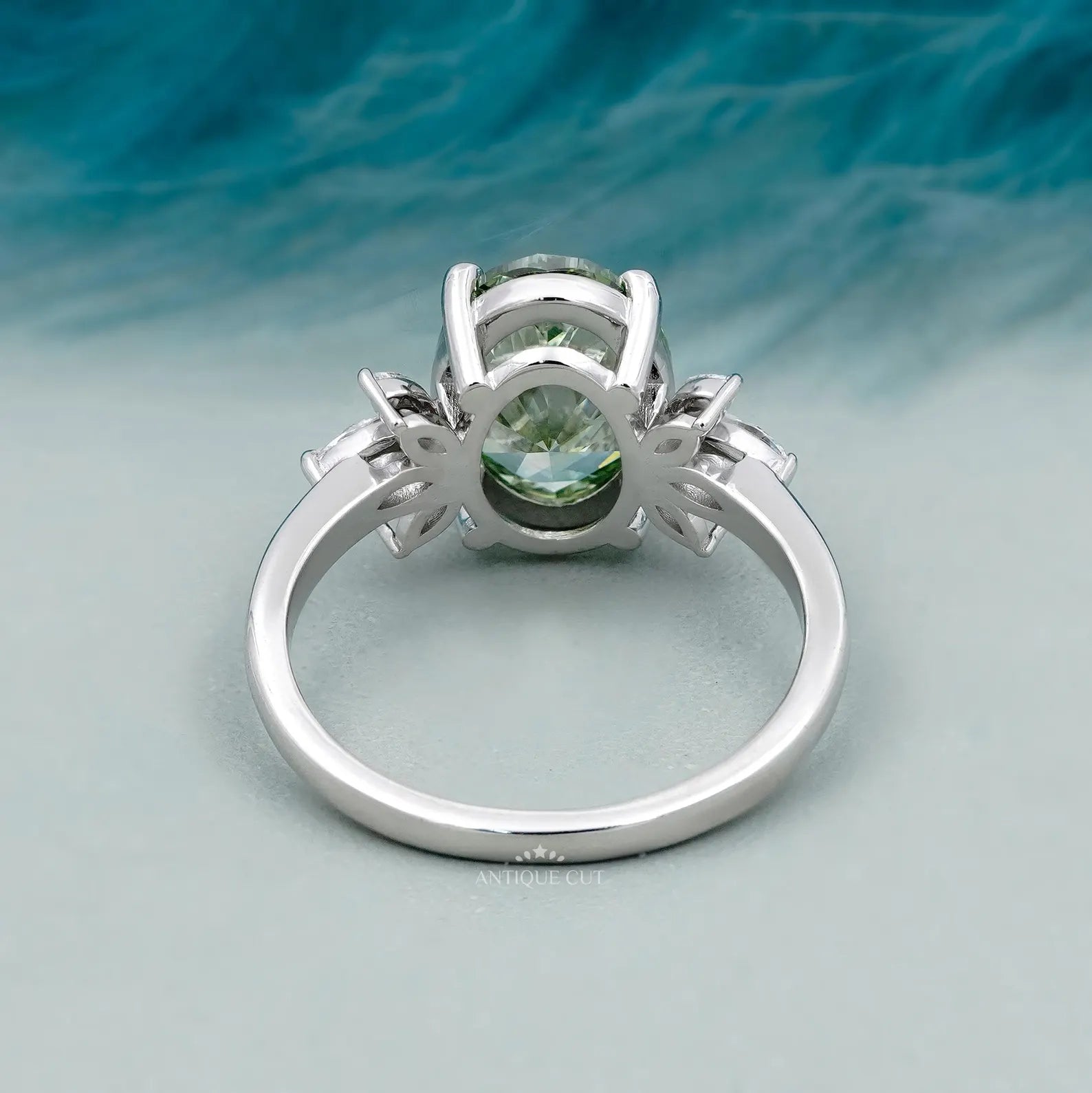 Oval Cut Antique Green Diamond Ring With Marquise Side Stones