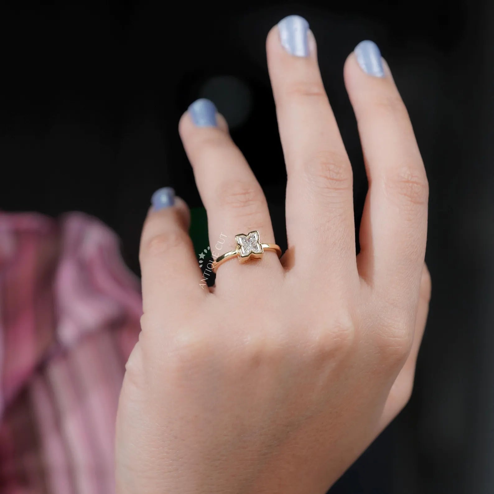 Yellow Gold X Ring featuring bezel set lab grown diamonds
