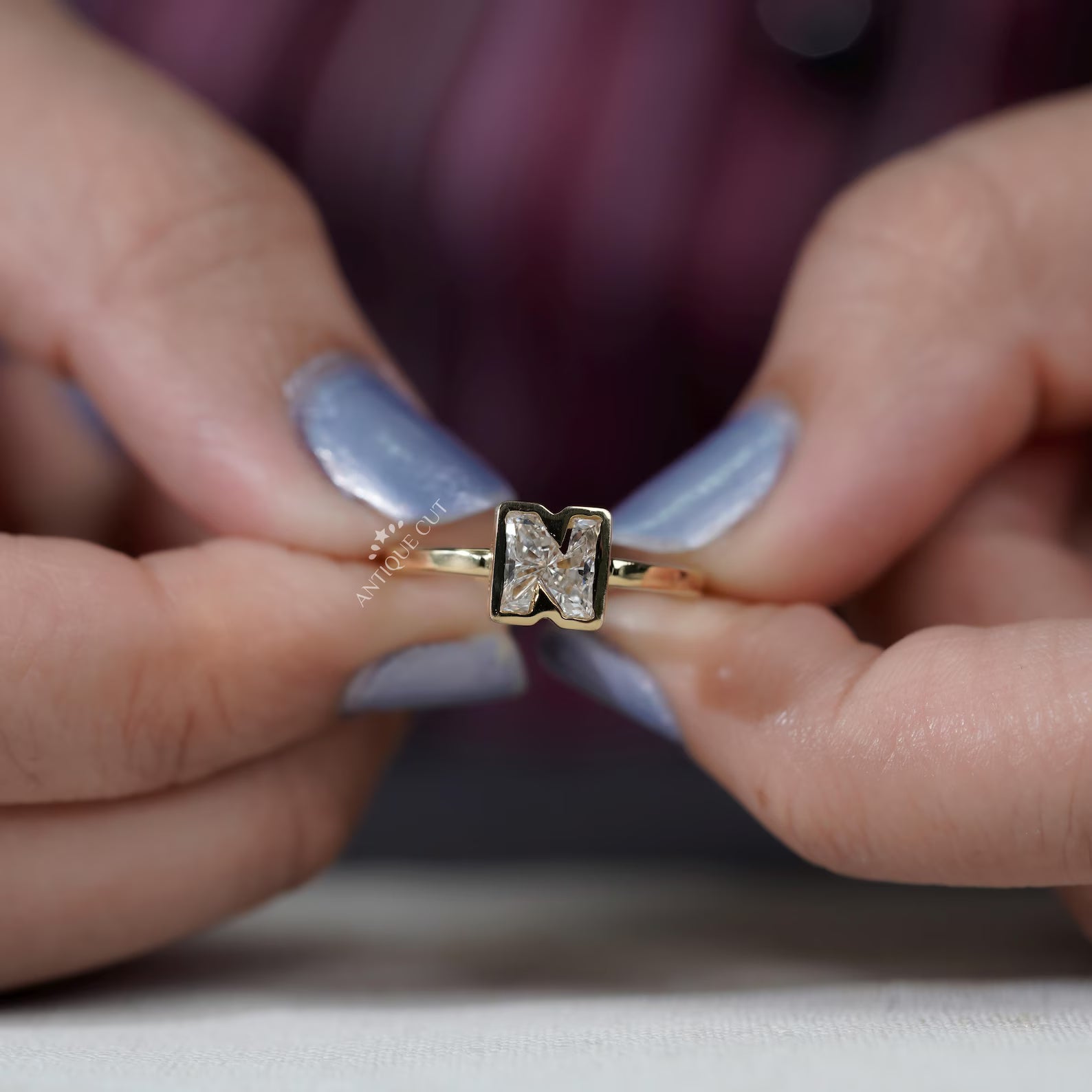 N letter ring with bezel set lab grown diamonds in yellow gold