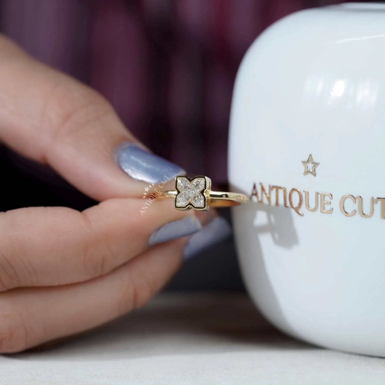 Yellow Gold X Letter Ring with bezel diamond setting