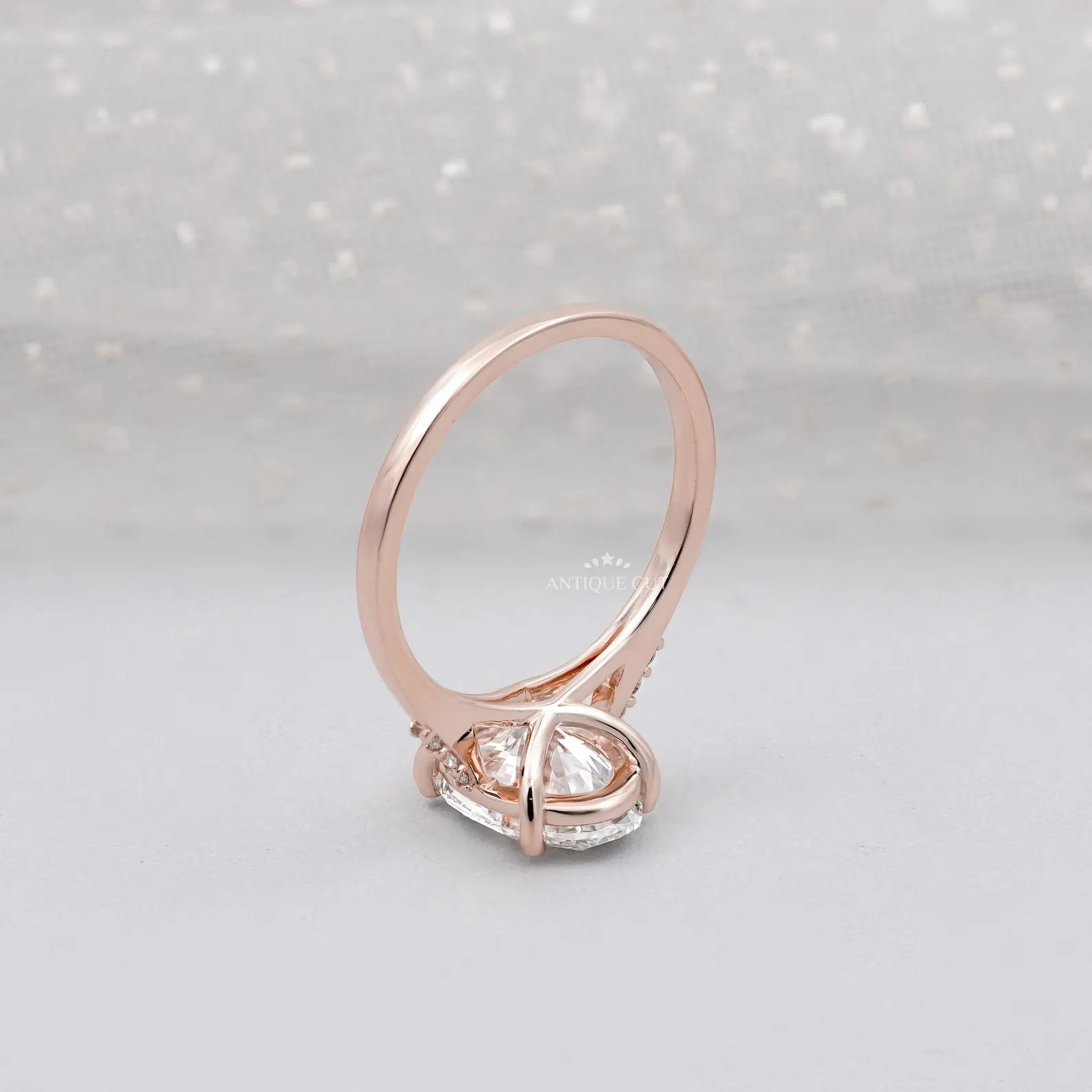 IGI certified oval diamond engagement ring in rose gold


