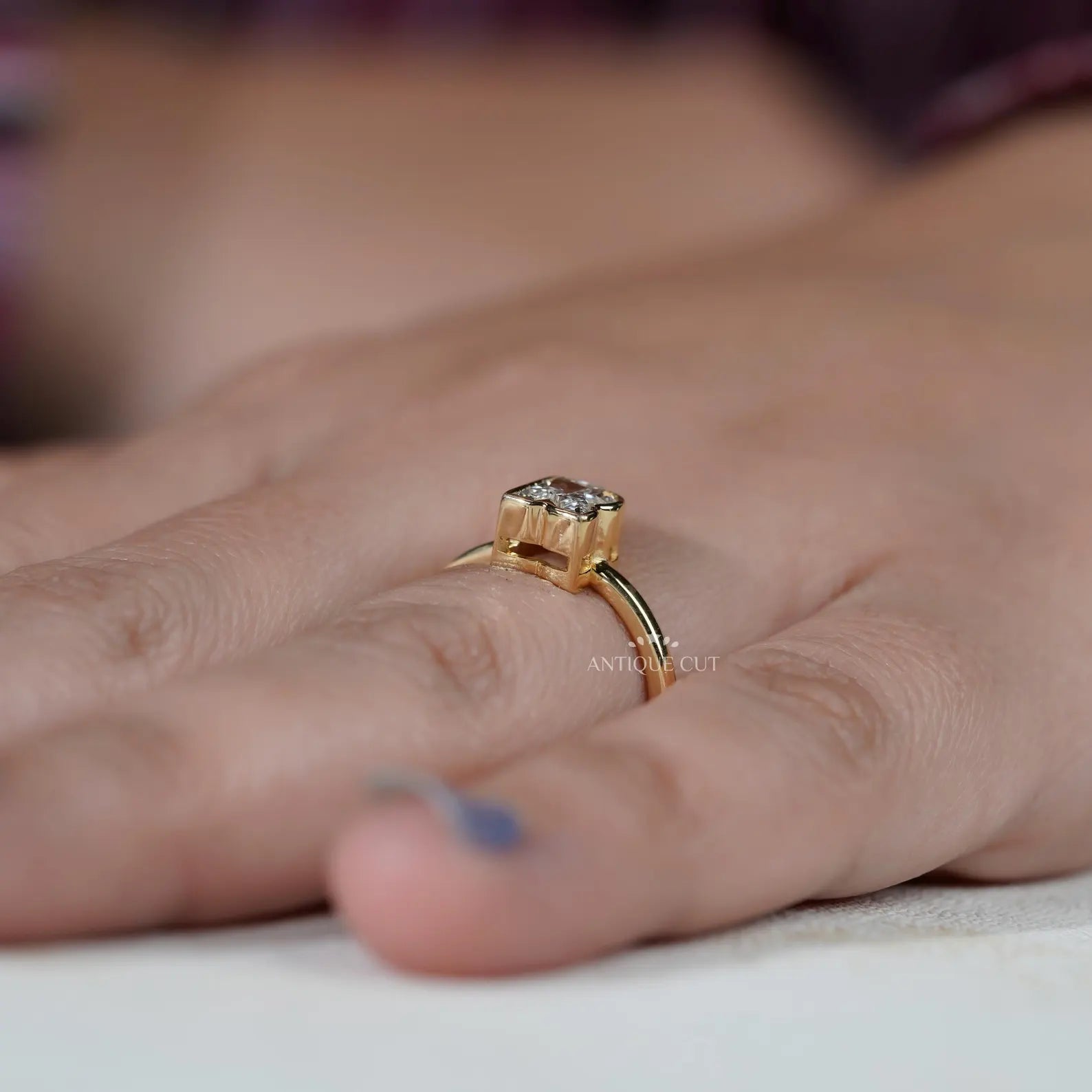 Yellow gold R letter ring with bezel set lab grown diamond
