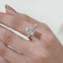 Yellow gold engagement ring featuring radiant cut diamond and hidden halo setting