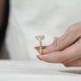 Radiant cut lab grown diamond ring with claw prongs and pavé accented yellow gold band