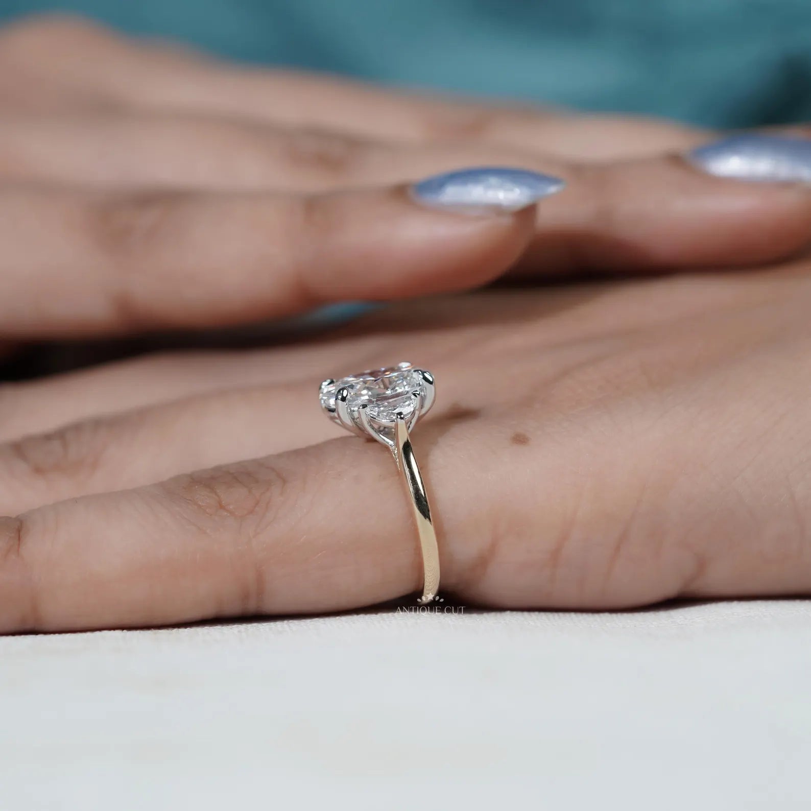 Oval Engagement Ring with Three Stone in Yellow Gold
