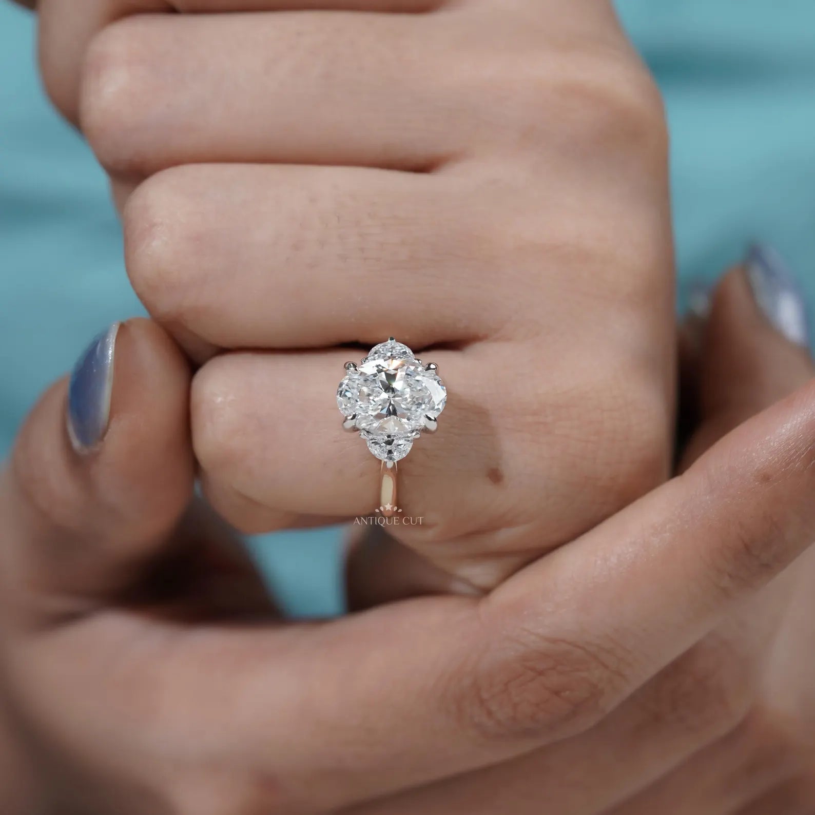 Oval Engagement Ring with Three Stone in Yellow Gold