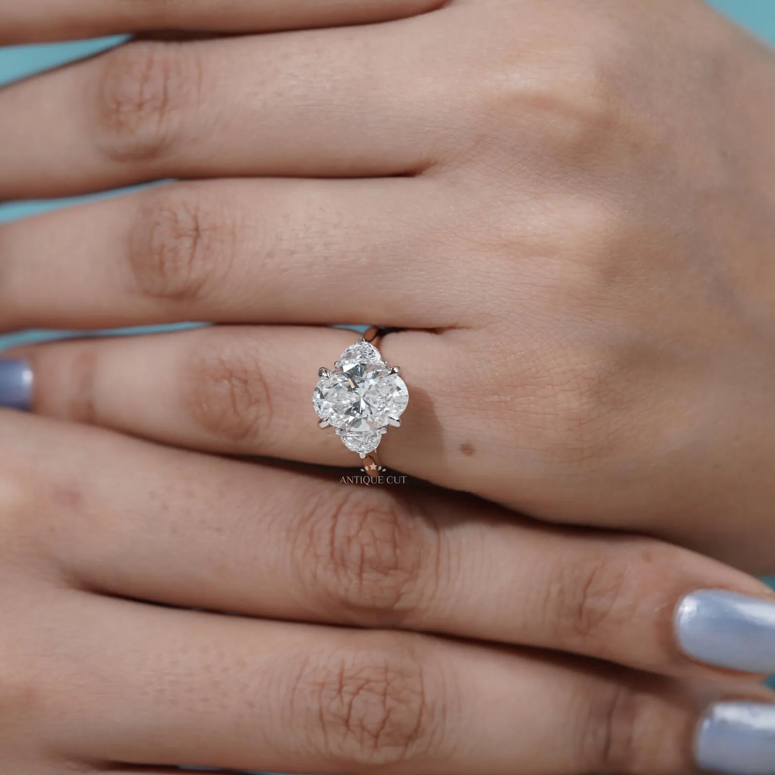 Oval Engagement Ring with Three Stone in Yellow Gold