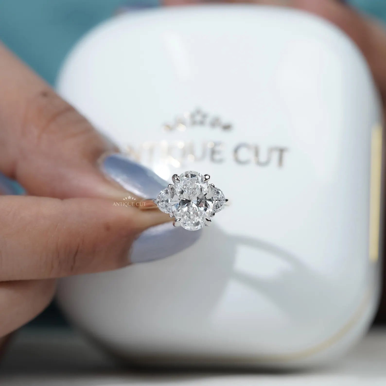 Oval Engagement Ring with Three Stone in Yellow Gold