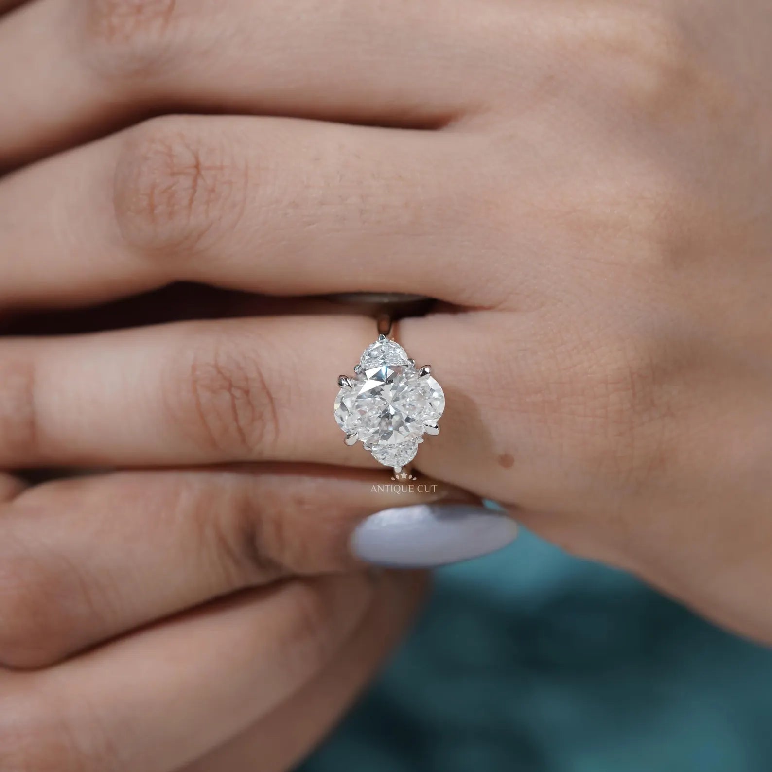 Oval Engagement Ring with Three Stone in Yellow Gold