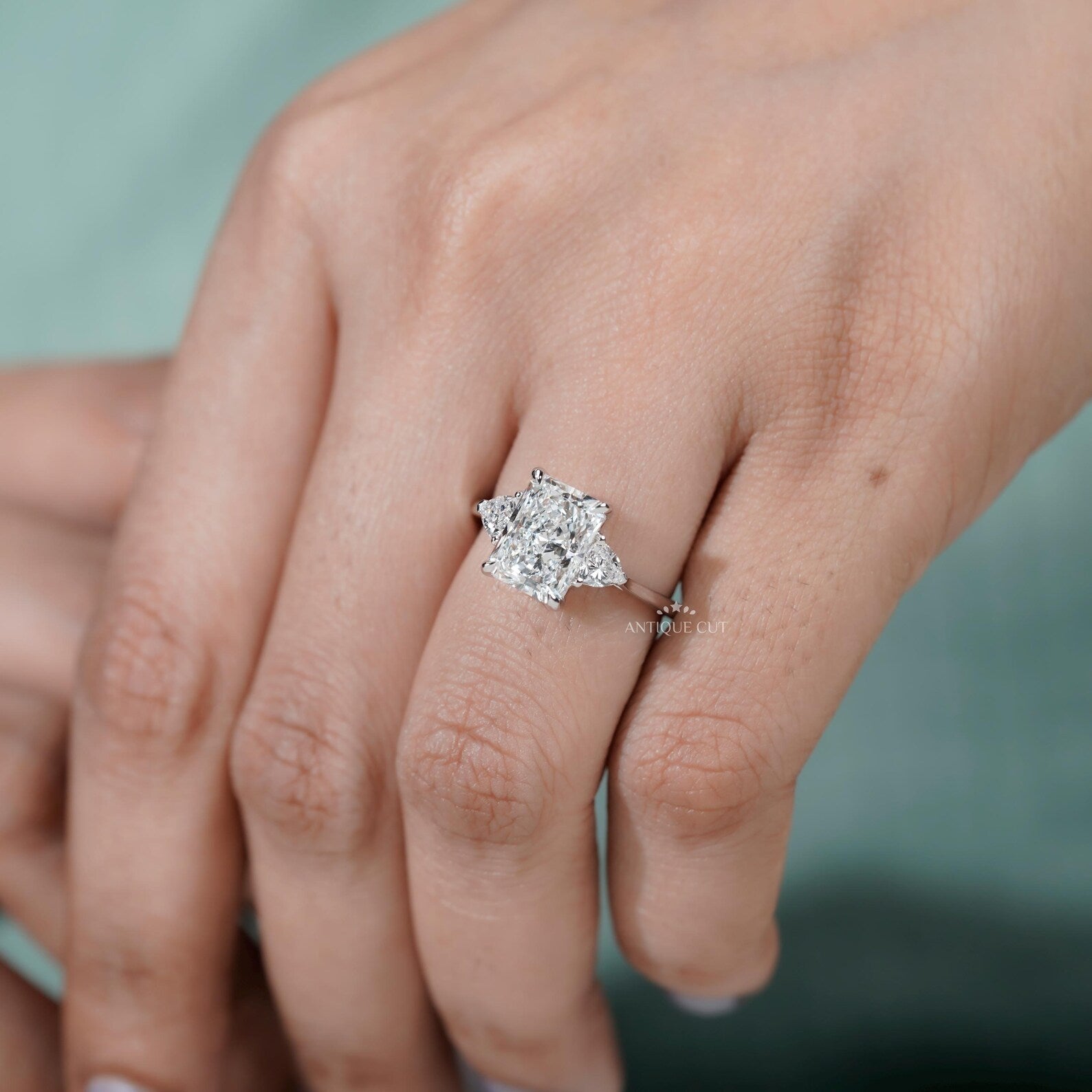 Radiant Cut Engagement Ring With Three Stone