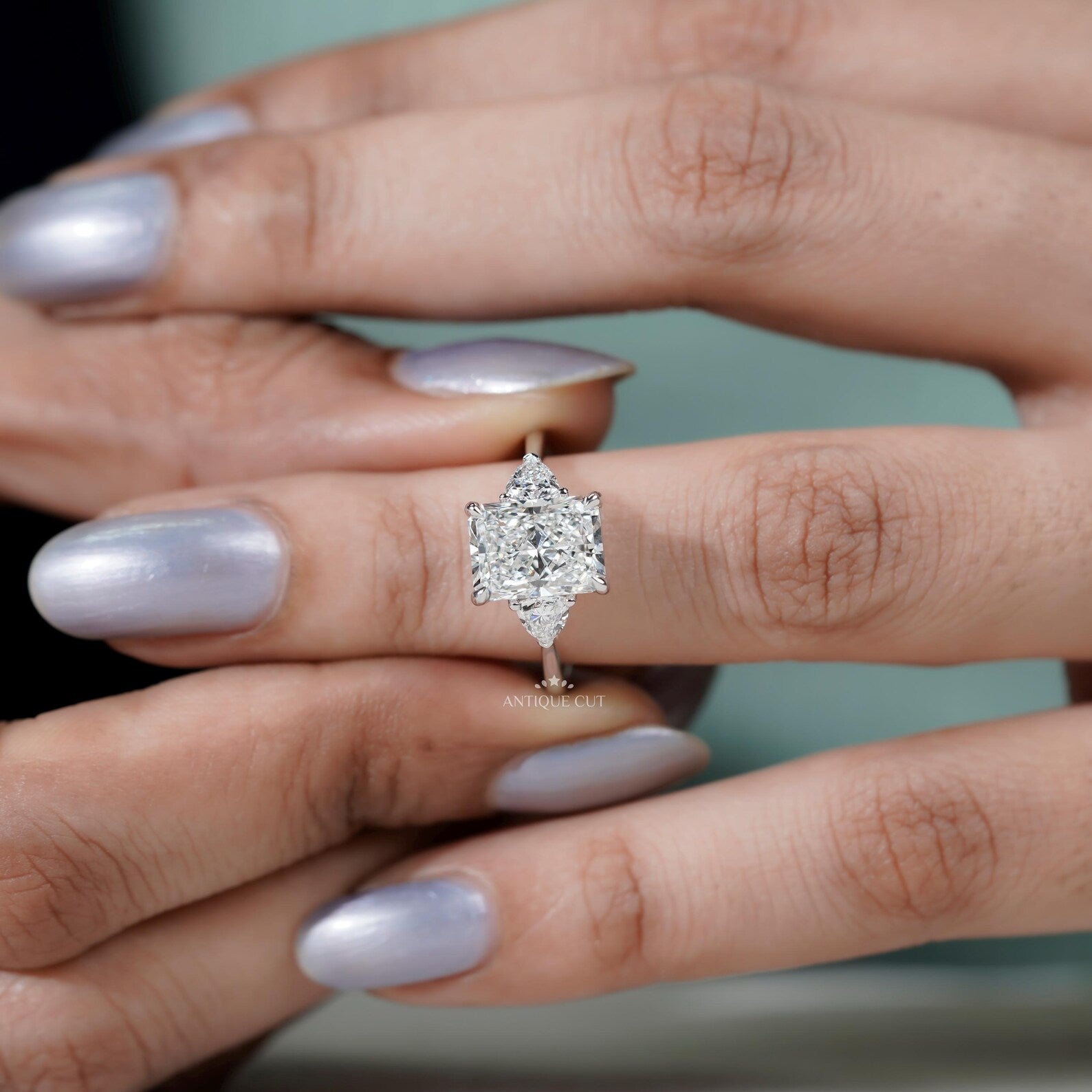 Radiant Cut Engagement Ring With Three Stone
