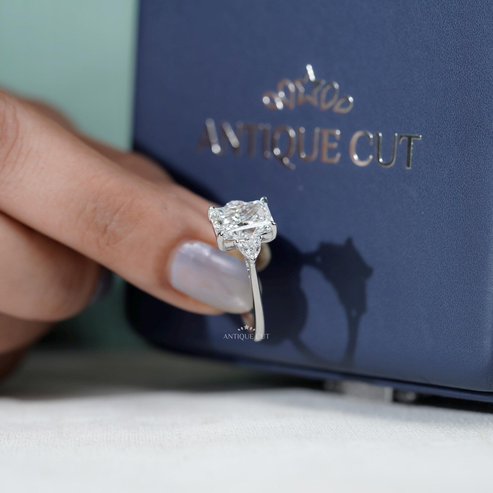 Radiant Cut Engagement Ring With Three Stone