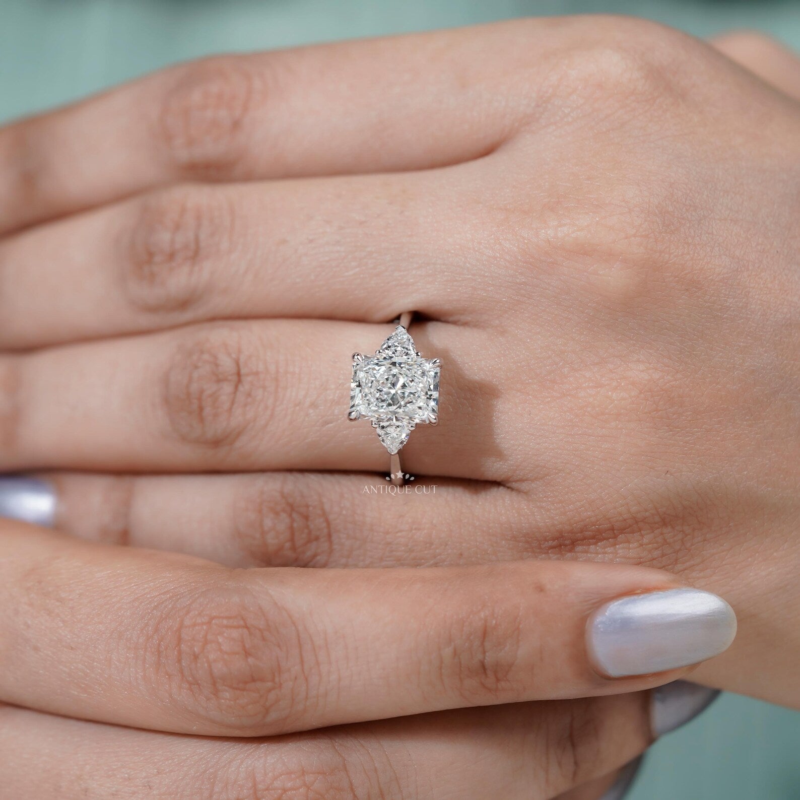 Radiant Cut Engagement Ring With Three Stone
