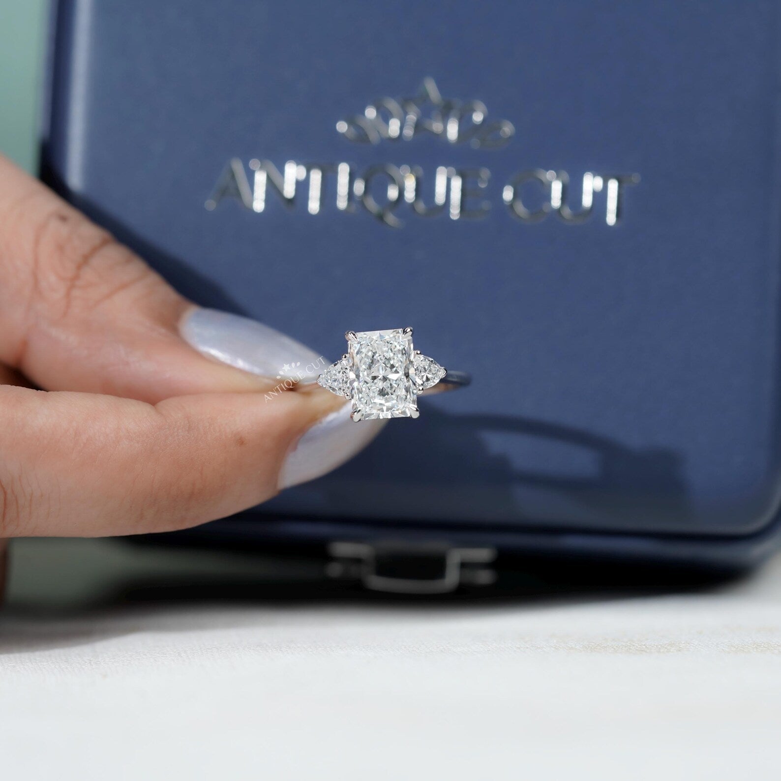 Radiant Cut Engagement Ring With Three Stone