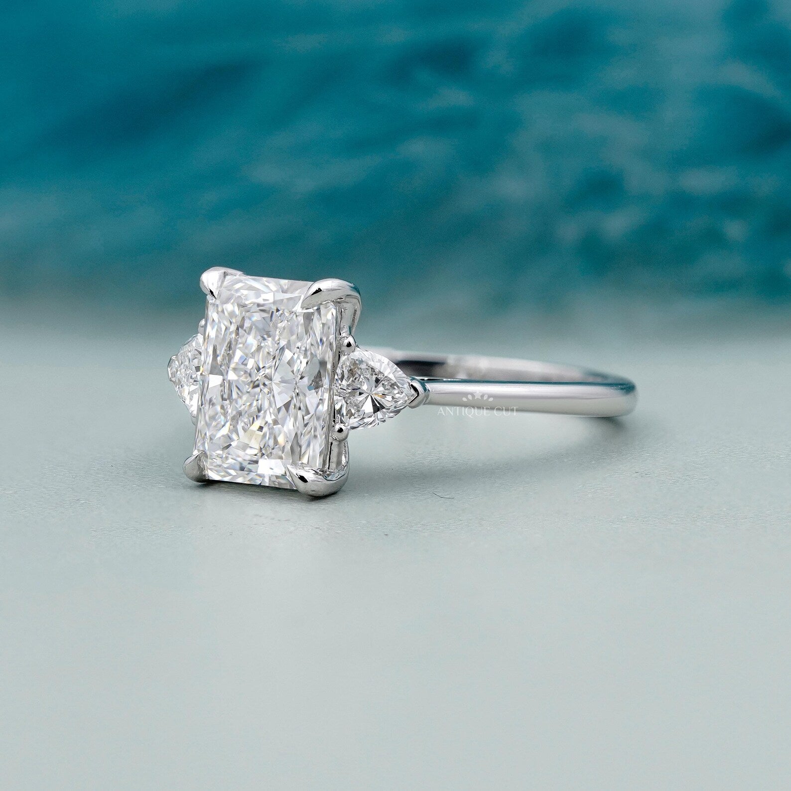 Radiant Cut Engagement Ring With Three Stone