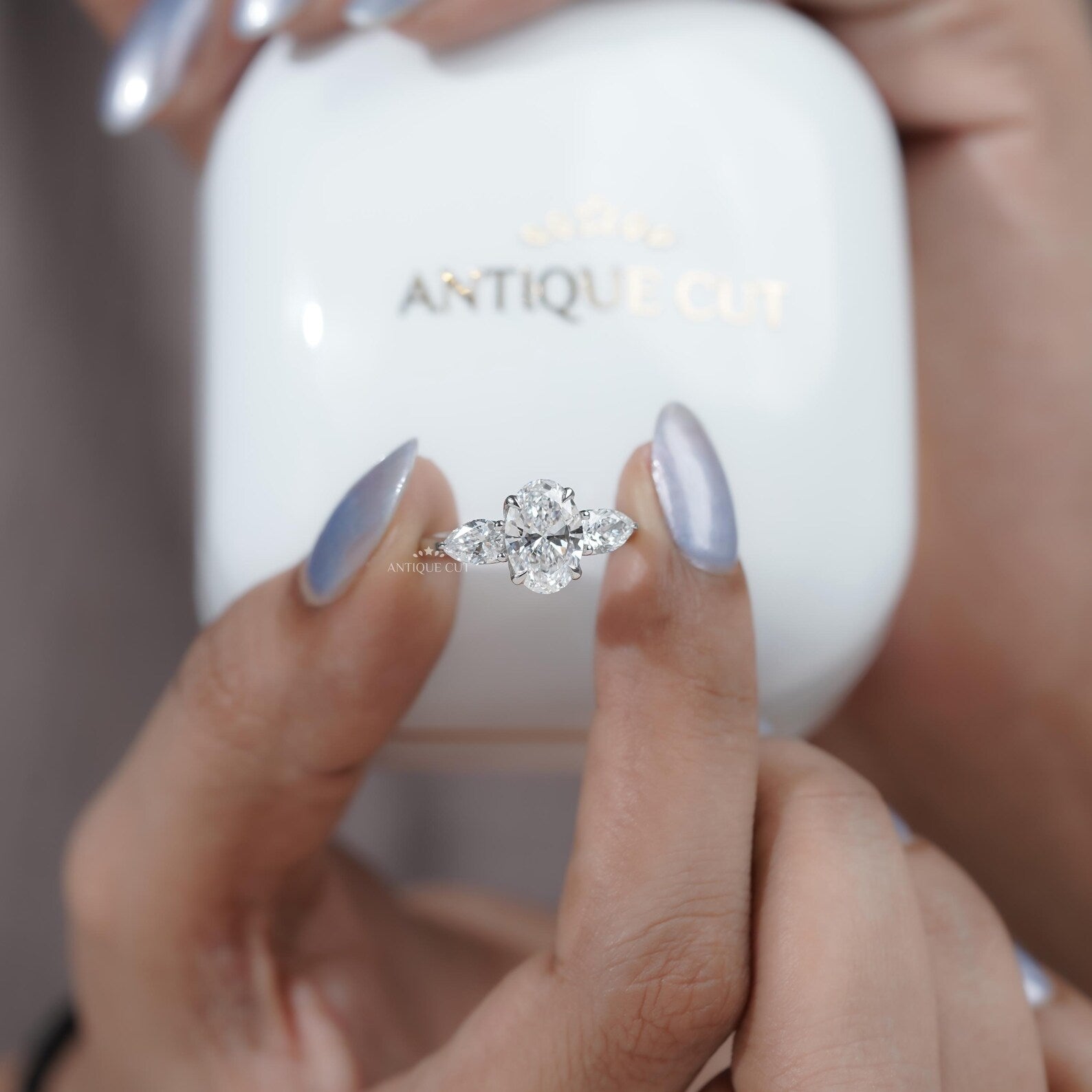 Three Stone Oval Cut Diamond Ring