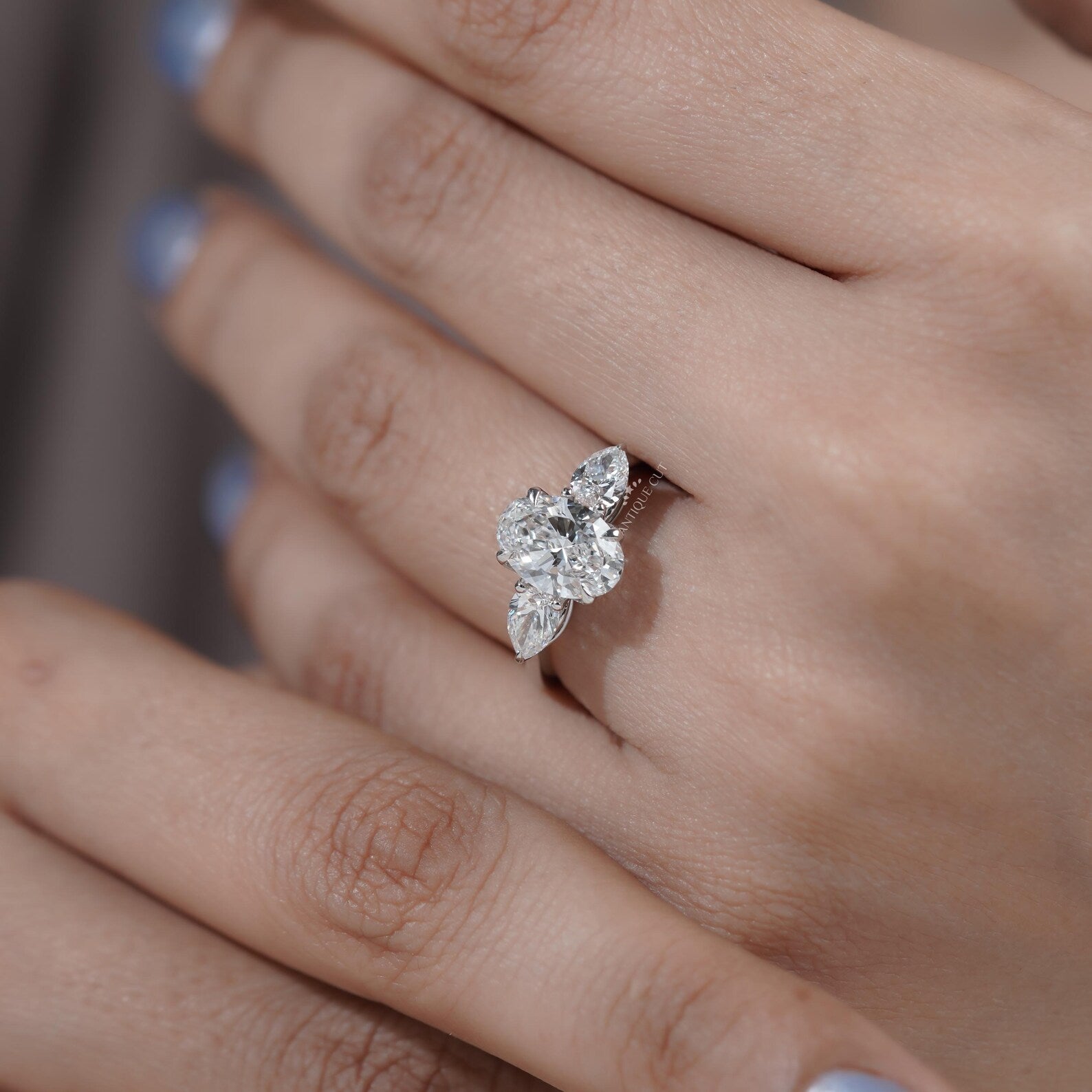 Three Stone Oval Cut Diamond Ring