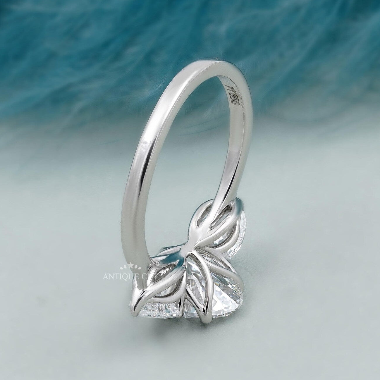 Three Stone Oval Cut Diamond Ring