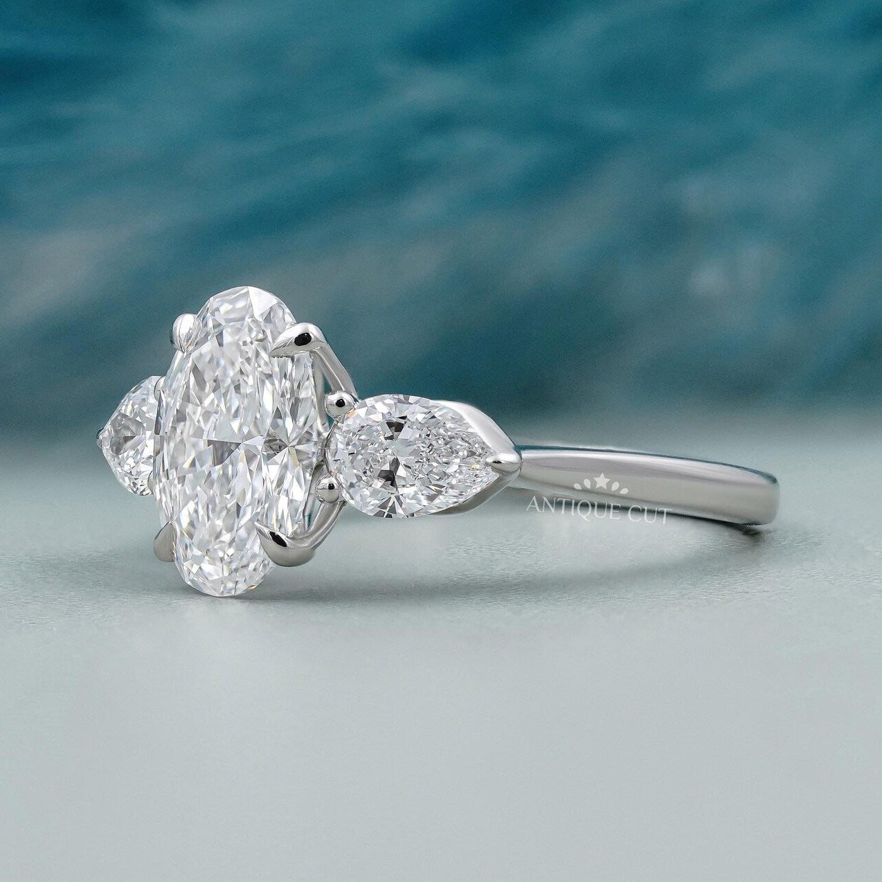 Three Stone Oval Cut Diamond Ring